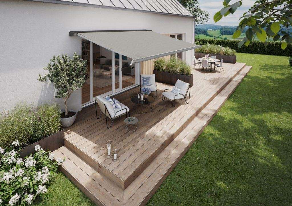 markilux mx 2 mit zweifarbiger kassette in grau und silber mit grauem tuch uber einer terrasse